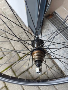 28 Zoll Alu Hinterrad 19-622 Laufrad Felgenbremse inkl. 8 Fach Zahnkranz 24 Gang Kunden-Foto 1