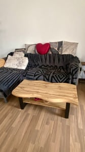 Couchtisch mit Baumkante Gabriel - Nachbildung Akazie Grau - große Ablage - Metallkufengestell Schwarz - 110x60cm Kunden-Foto 1