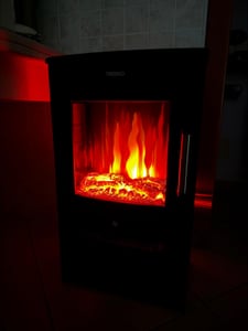 Kominek elektryczny TRESKO® z ogrzewaniem wraz z pilotem zdalnego sterowania i aplikacją WiFi | kominek elektryczny 1800W LED efekt płomienia tryby kolorów | kominek termostat ognia, timer | kominek elektryczny piec wolnostojący kominek 2 poziomy ogrzewania Zdjęcie produktu od klienta nr 4