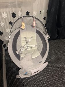 CARETERO Kinder Schaukelstuhl Opti - 360 Grad Drehung - Moskitonetz - Beige Kunden-Foto 2