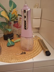 Munddusche, Professionelle Elektrische Kabellose Munddusche, Munddusche Zahnreiniger Wasser Flosser Oral irrigator, 3 Modi, IPX7 Wasserdicht mit 5 Düsen, USB-Ladekabel, 350ML Rosa Kunden-Foto 1