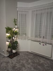COSTWAY Plantenstandaard met groeilampen, 8-laags plantenrek, bloemenstandaard, metalen en houten bloemenrek, 67 x 30 x 146 cm Klantenfoto 1