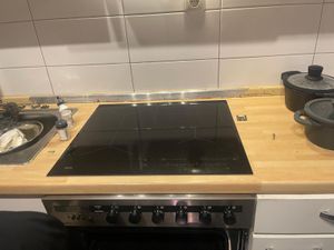 AEG TO64IC00FB, Čierna, Nerezová oceľ, Vstavaný, 57.6 cm, Indukčná varná doska so zónami, 4 zone(s), 4 zone(s) Photo du client 1