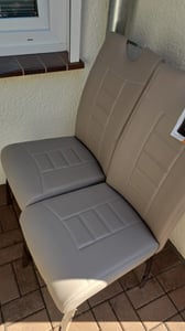 4er Set Esszimmerstuhl Andrea - Kunstleder Grau - Bügelgriff und Metallgestell verchromt -140 kg Belastbarkeit - ergonomische Lehne mit Steppung Kunden-Foto 1