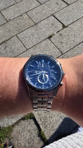 Citizen Uhr AT8218-81L FunkEco Drive Herrenuhr Titan Blaues Zifferblatt Solar Chronograph ewiger Kalender Kunden-Foto 1