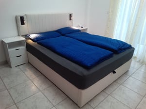 Flieks Polsterbett 140x200cm mit Leselampe, Doppelbett Stauraumbett Boxspringbett mit Ladefunktion (USB, Typ-C), Jugendbett mit Lattenrost, Baumwolle Kunden-Foto 1