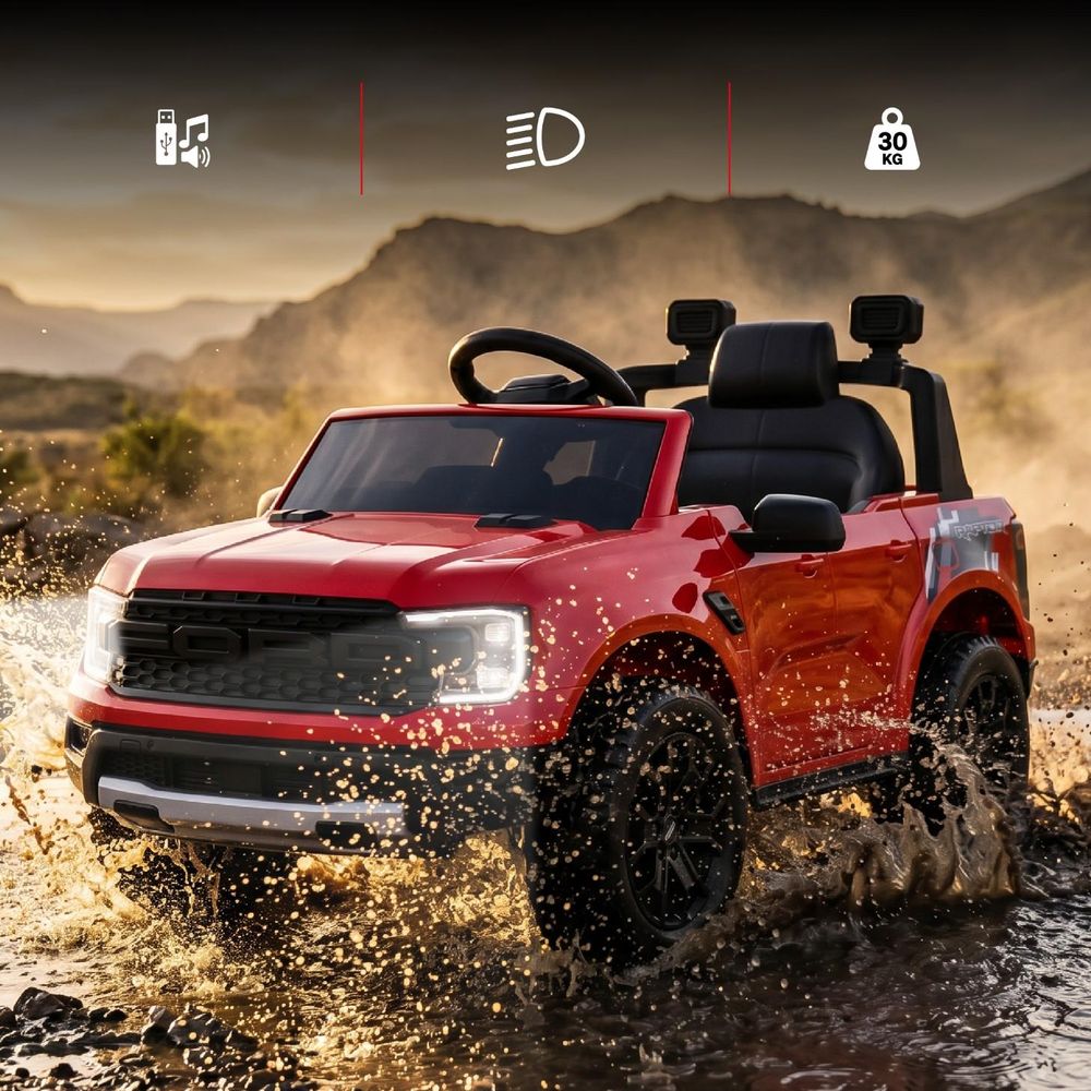 Auto Ford Raptor z włączonymi światłami, woda rozpryskująca się spod kół.