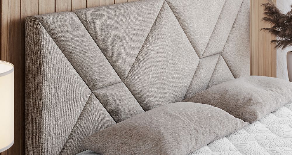 Vergrößern Sie das Kopfteil des Boxspringbettes, das Foto zeigt beige Stoff