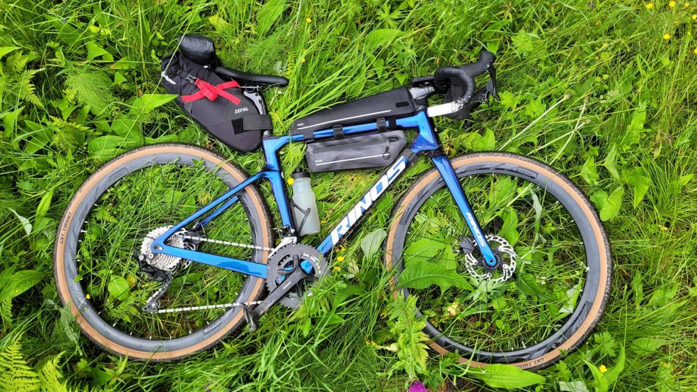RINOS Sandman Gravel Bike in Blue mit Chameleon-Glanzlack