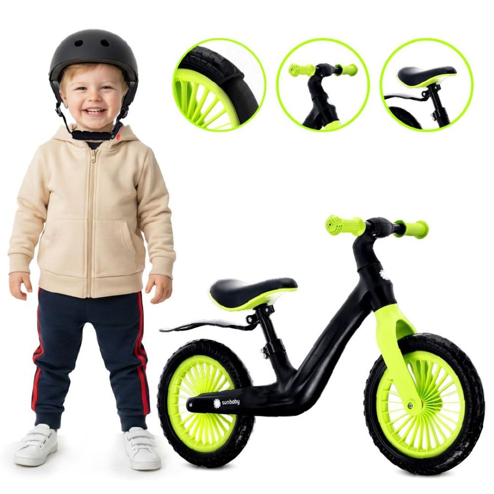 Niño sonriente junto a la bicicleta sin pedales Sun Baby Sport y detalles del manillar y asiento.
