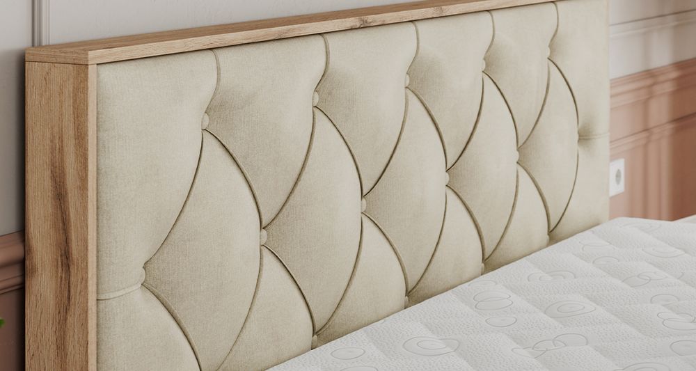Vergrößern Sie das Kopfteil des Boxspringbettes, das Foto zeigt beige Stoff