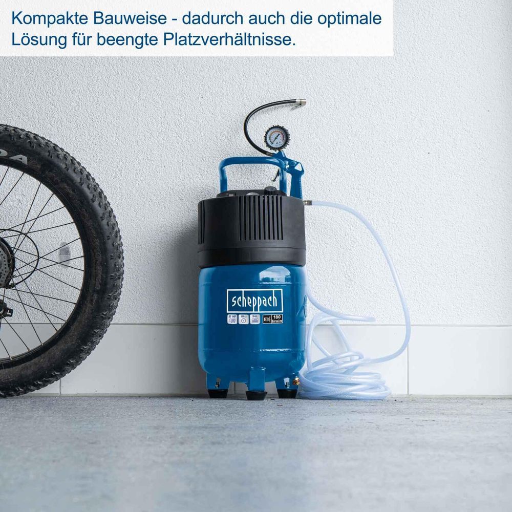 Das Bild zeigt den Druckluftkompressor bei der Anwendung, wie ein Reifen aufgepumpt wird.