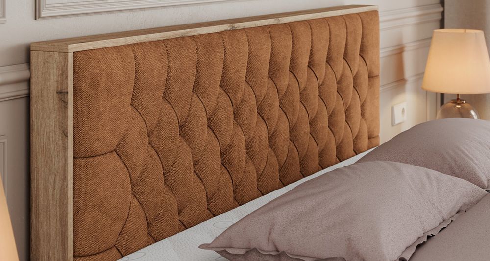 Vergrößern Sie das Kopfteil des Boxspringbettes, das Foto zeigt orange Stoff