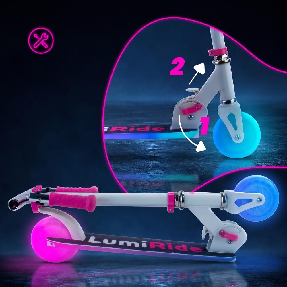 Zusammengefalteter Sun Baby Lumiride Tretroller mit abgenommenen Griffen.