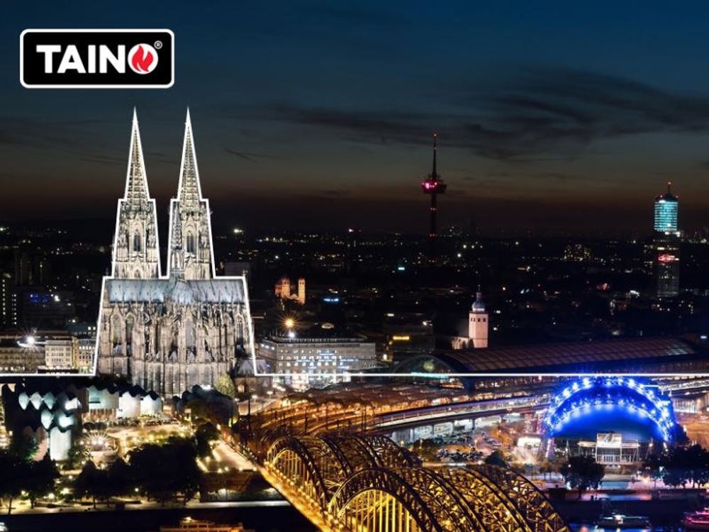 Nachtaufnahme vom Kölner Dom in Stadtbild mit TAINO-Logo.