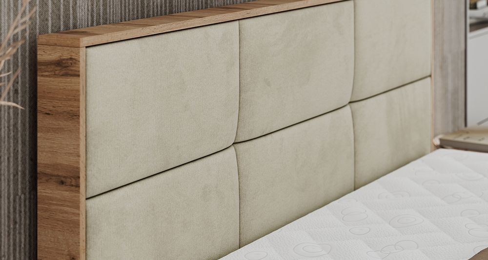 Vergrößern Sie das Kopfteil des Boxspringbettes, das Foto zeigt beige Stoff