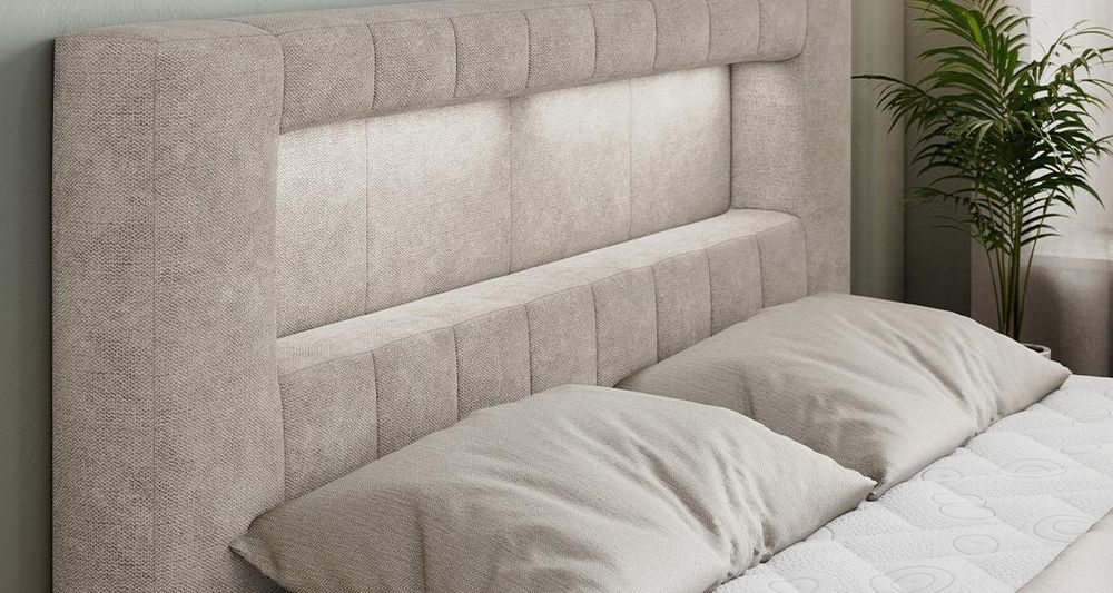 Vergrößern Sie das Kopfteil des Boxspringbettes, das Foto zeigt beige Stoff