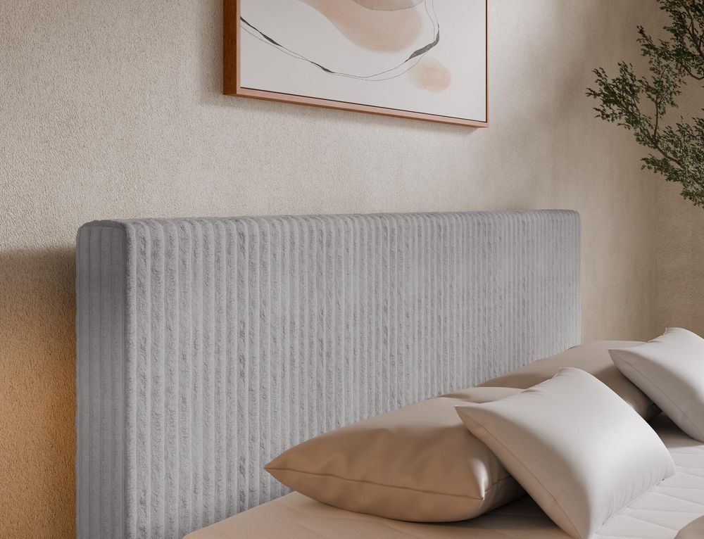 Detailansicht vom Stoff Tilia mit vertikaler Rippenstruktur am Boxspringbett