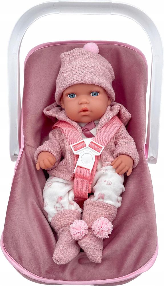 Babypuppe im rosa Outfit