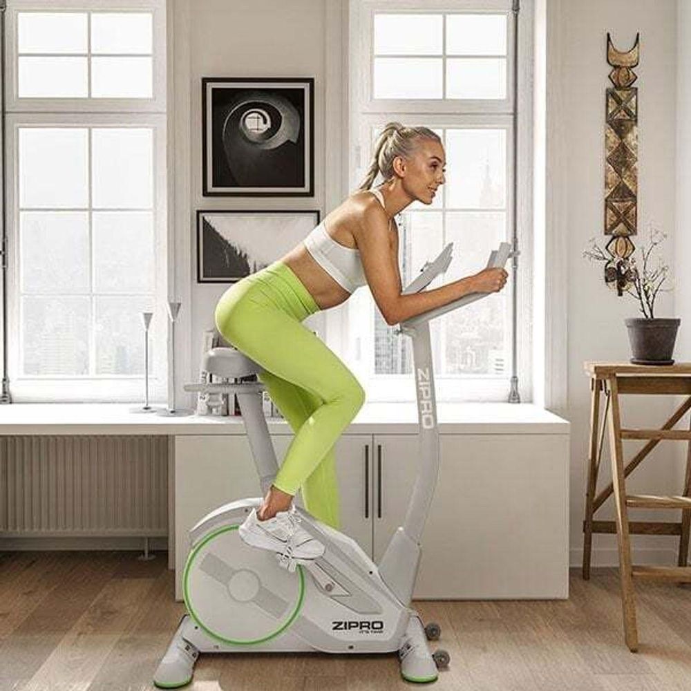 Rower ergometryczny Zipro Rave White – elektromagnetyczny rower treningowy w kolorze białym Sterowanie za pomocą aplikacji Zwift Regulowany kąt kierownicy i siodełka Program watowy