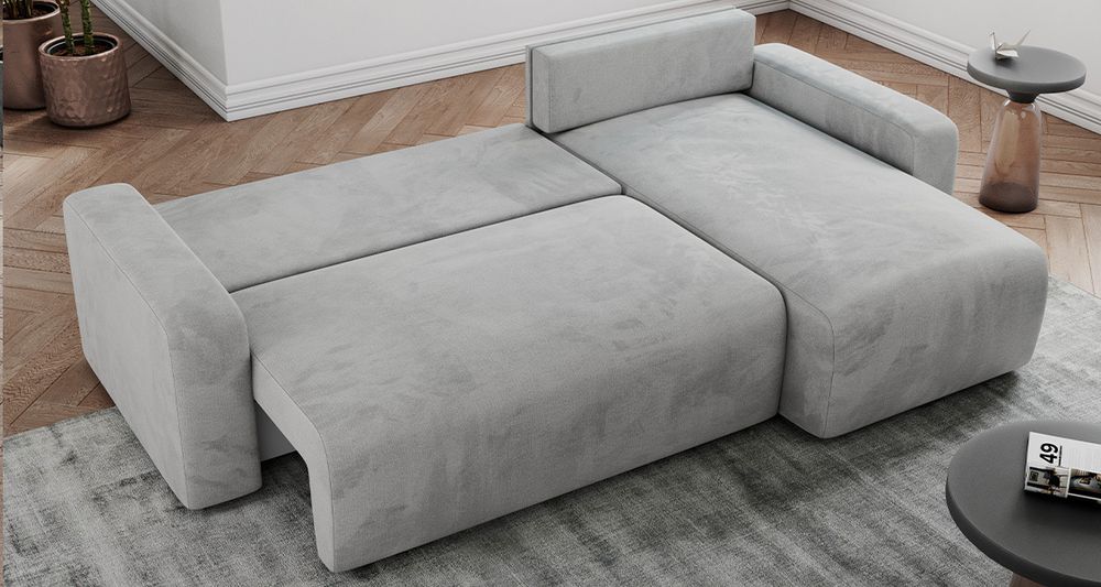 grau Ecksofa aus weichem velvet-Stoff. Foto zeigt Schlaffunktion