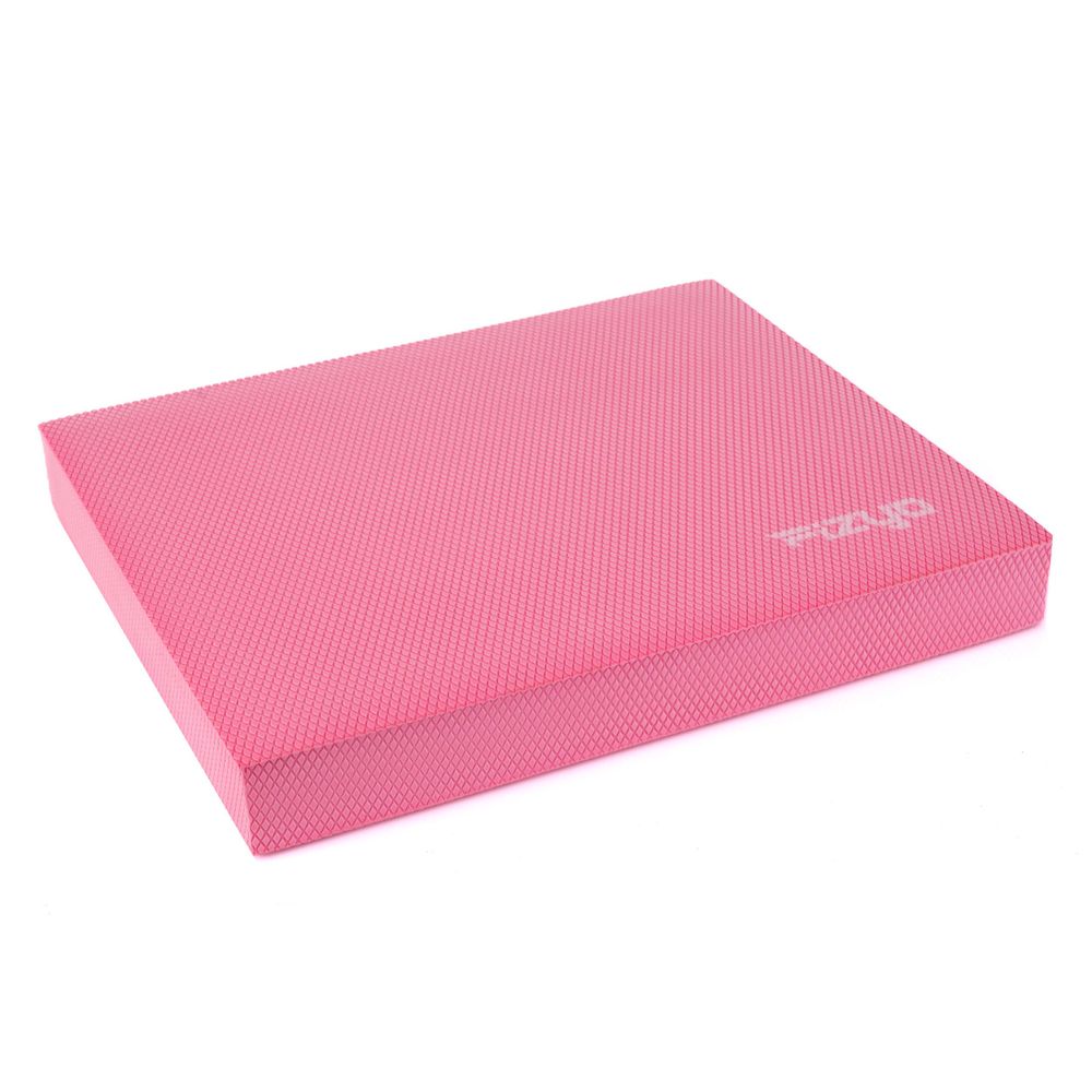 Person trainiert auf dem FIZYO Balance Pad, Matte, Balancekissen