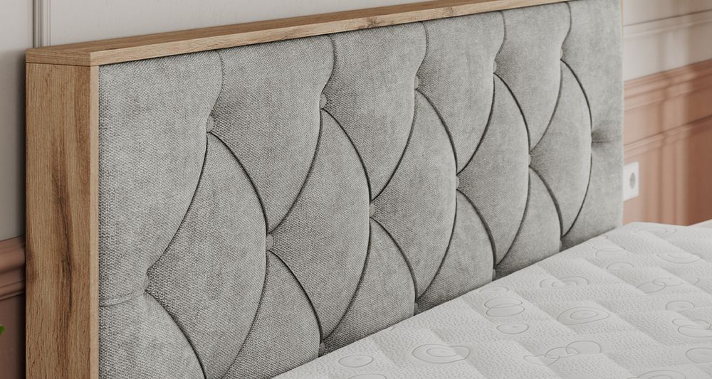 Vergrößern Sie das Kopfteil des Boxspringbettes, das Foto zeigt grau Stoff