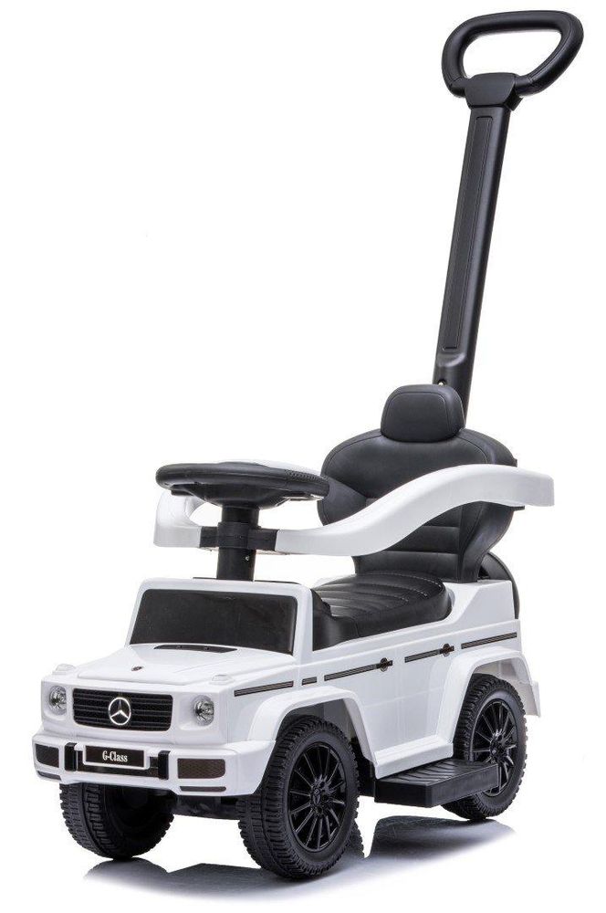 Zijaanzicht van de witte Mercedes-Benz loopauto met stuur en duwstang.