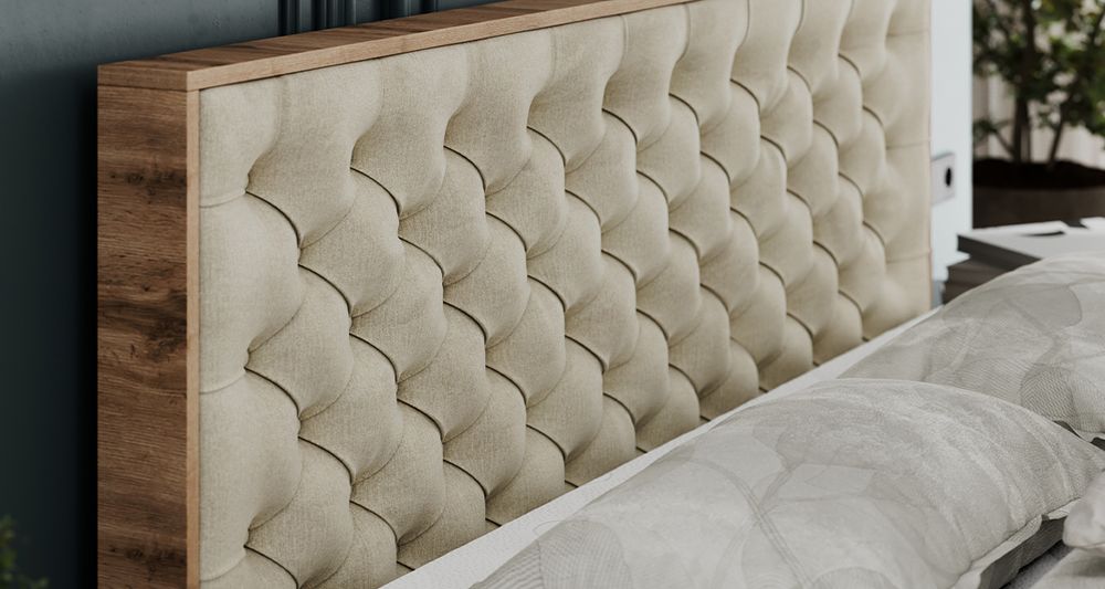 Vergrößern Sie das Kopfteil des Boxspringbettes, das Foto zeigt beige Stoff