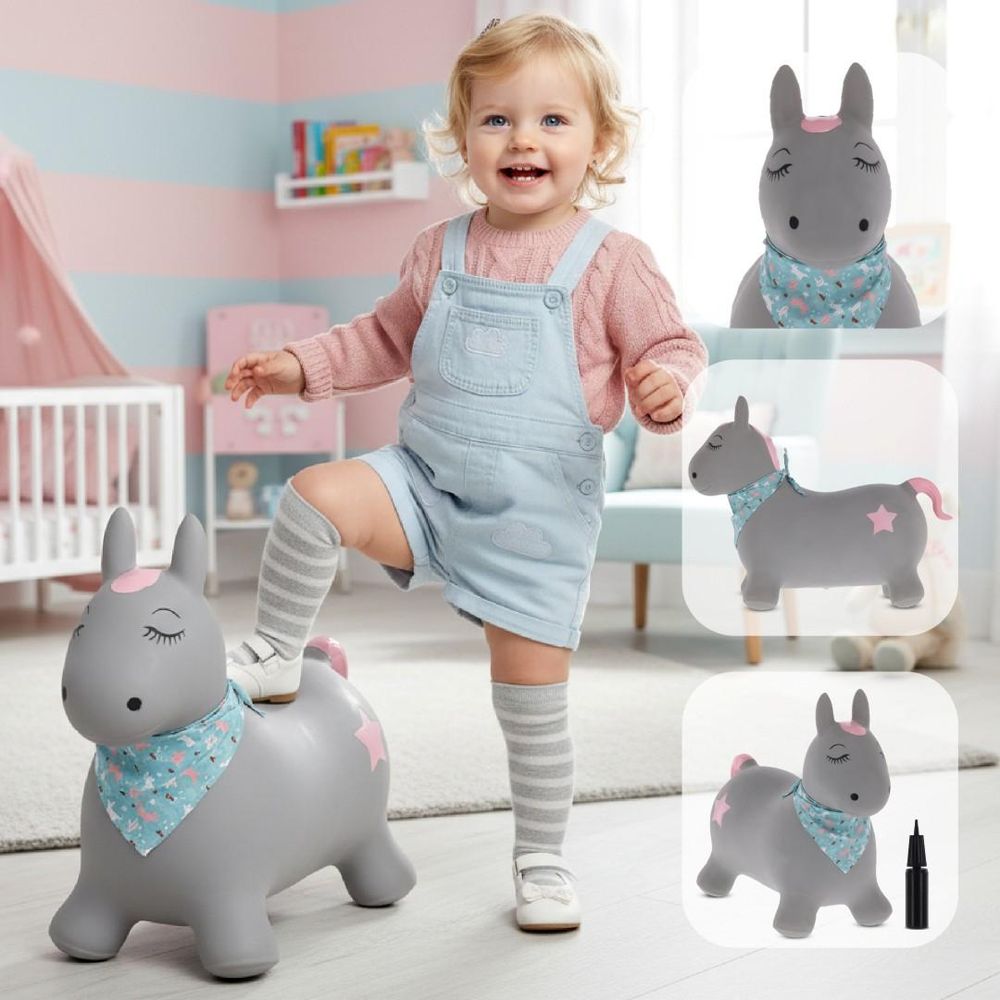 Niña jugando con el animal saltarín pony gris y accesorios incluidos