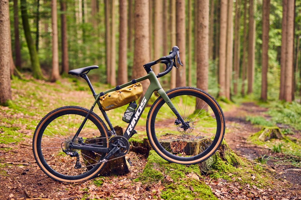 RINOS Sandman Gravel Bike in matter grüner Lackierung mit schwarzen Akzenten
