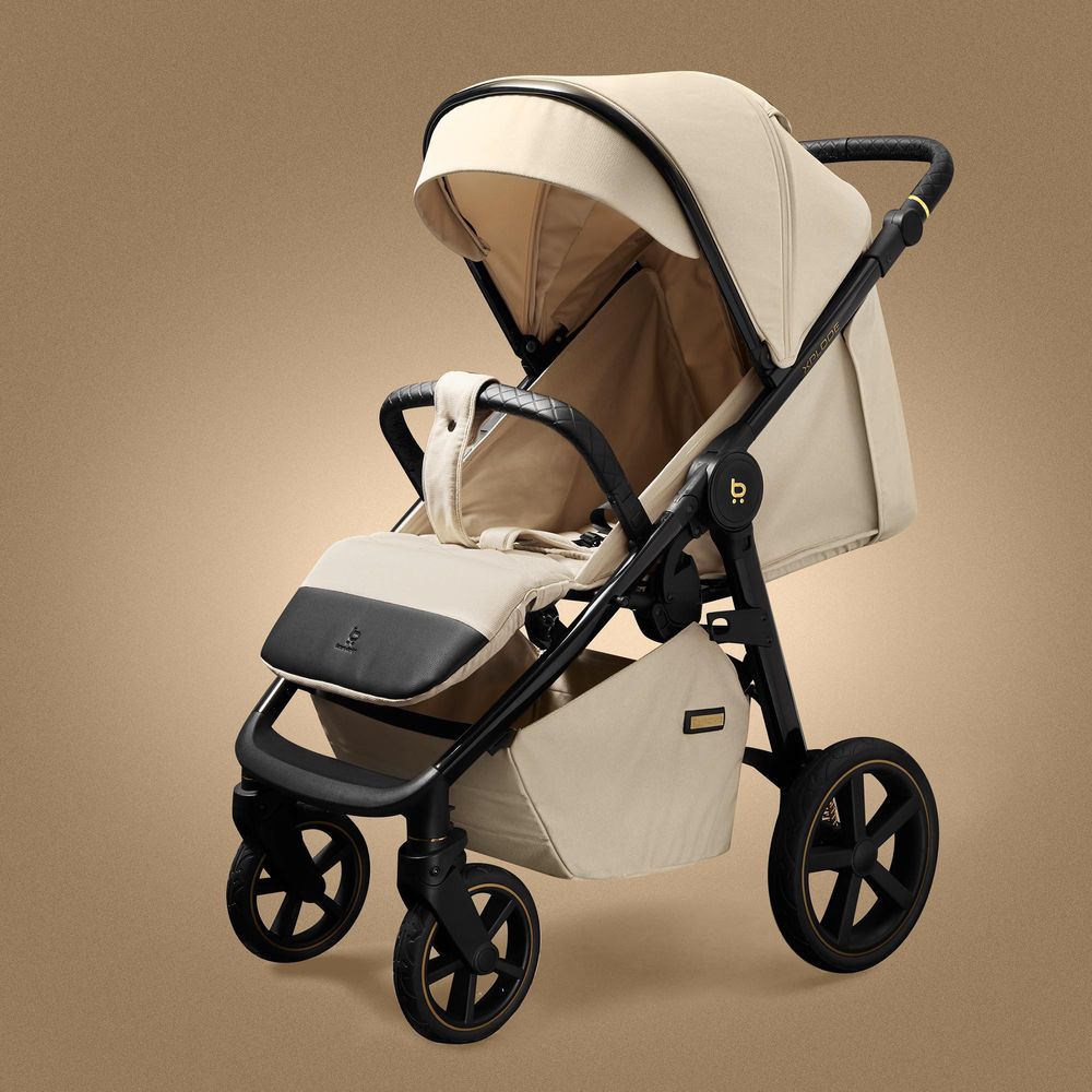 4Baby | Kočík - Kočík Buggy - Pieskovo béžová - UV50 ochrana - Nafukovacie pneumatiky a odpruženie - Skladanie jednou rukou - Do 22 kg - Xplode Chrome
