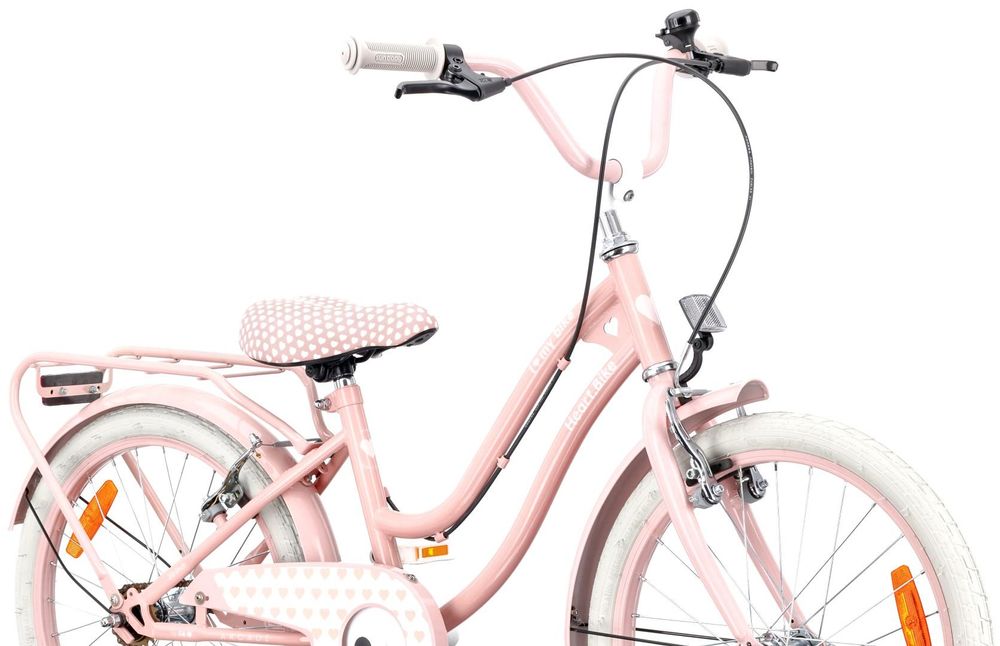 Detalle del manillar ergonómico y frenos de la bicicleta infantil.