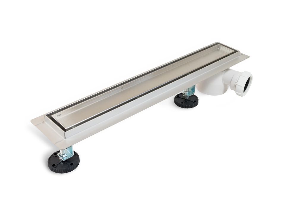 Lineare Duschrinne mit seitlichem 360°-Siphon und wendbarer Abdeckplatte