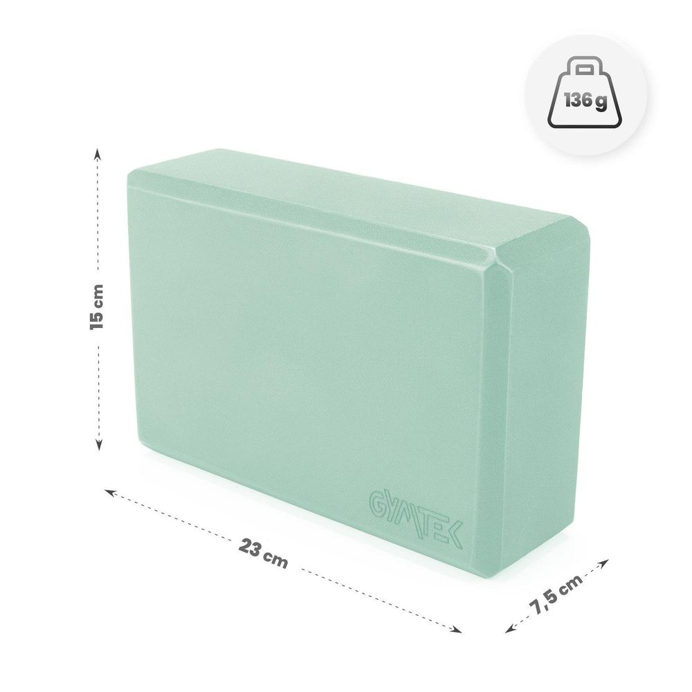 Ein Minz-Yogablock mit Abmessungen: 15 cm Höhe, 23 cm Länge, 7,5 cm Breite und 136 g Gewicht