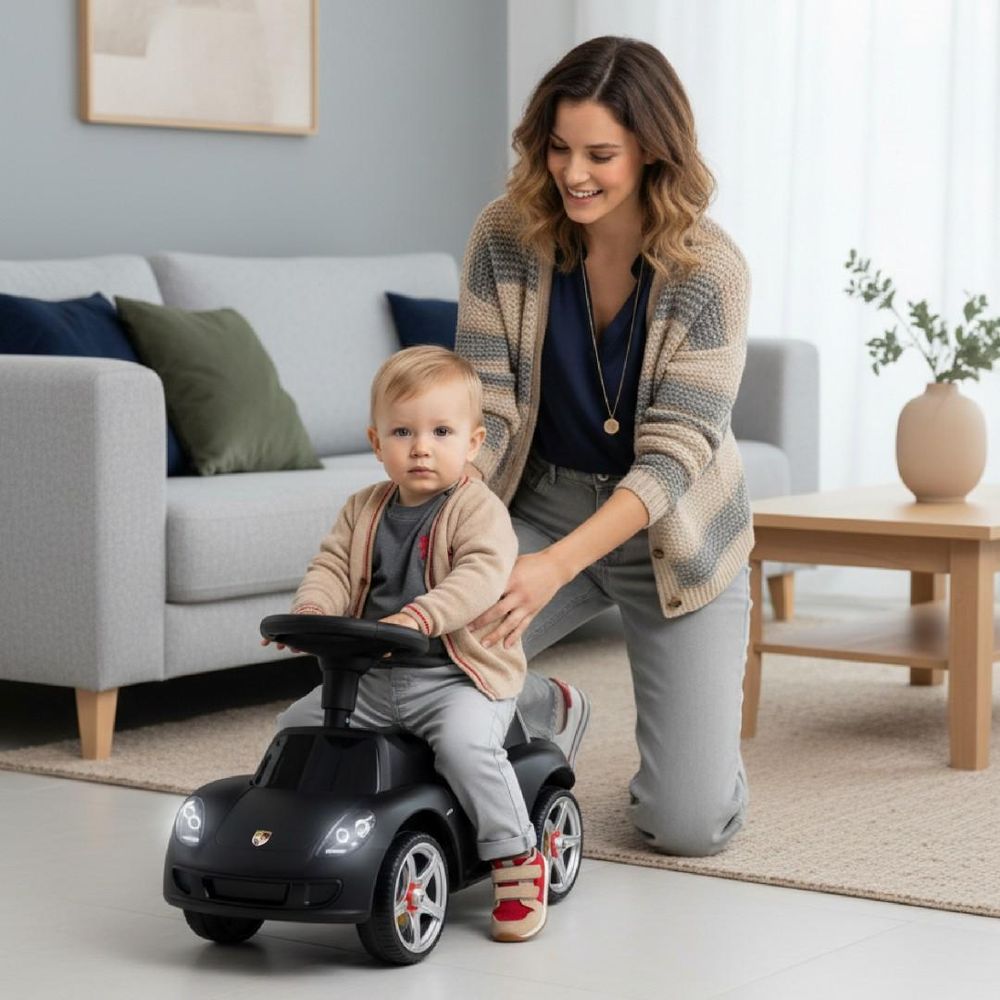 Adulte accompagnant un enfant assis sur le porteur SUN BABY.