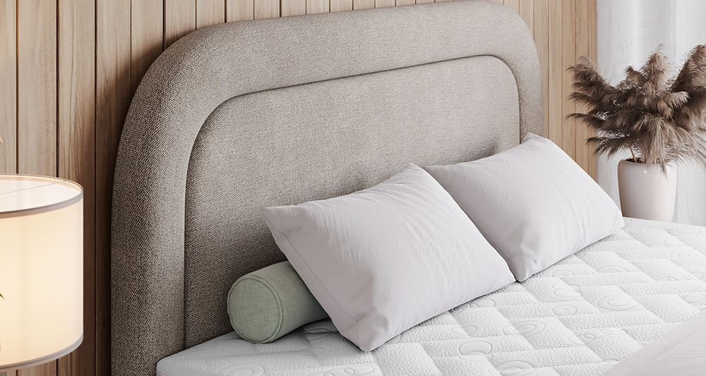 Vergrößern Sie das Kopfteil des Boxspringbettes, das Foto zeigt beige Stoff