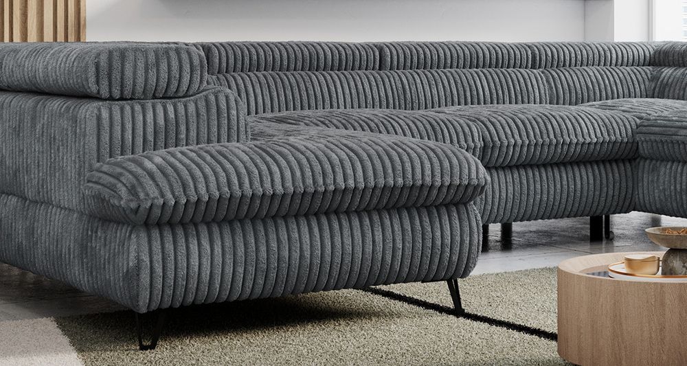 Zoomen Sie auf die Sitzfläche des Ecksofas. Sofa in Dunkelgrau Cord-Stoff