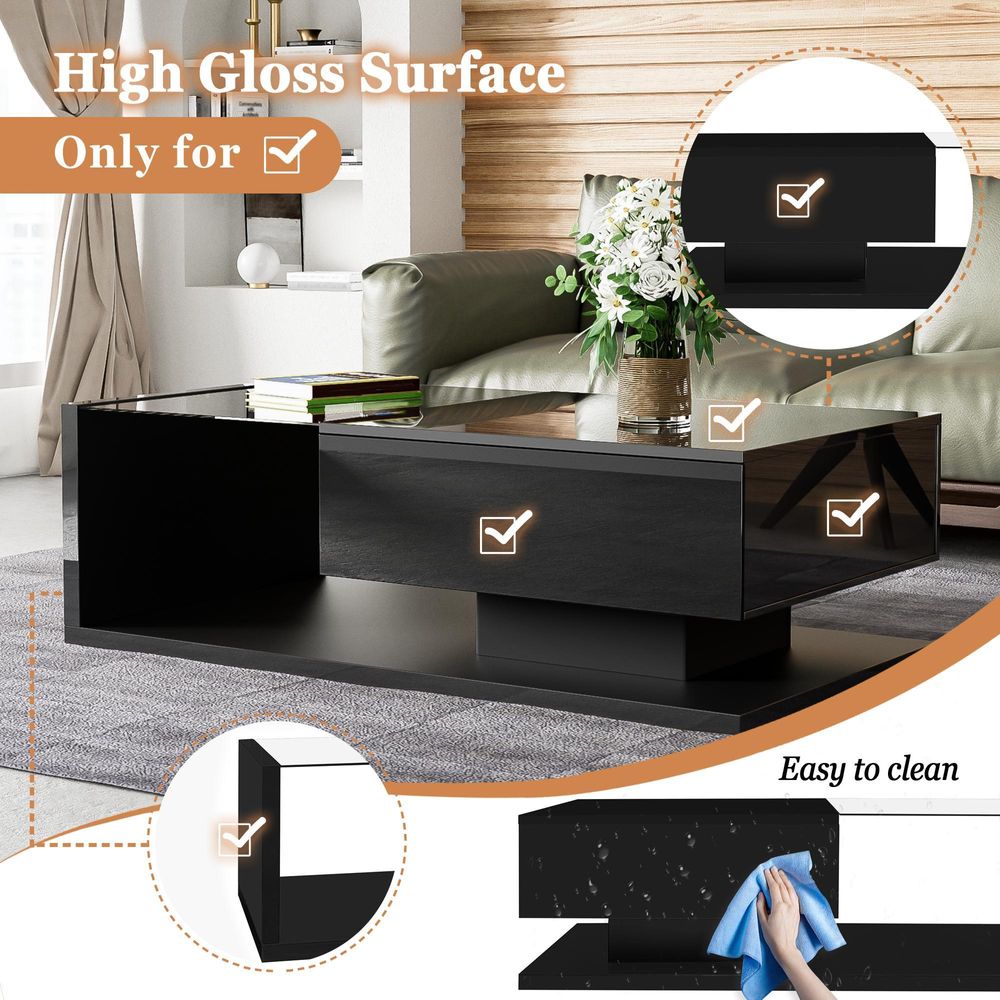 Moderner Couchtisch in Schwarz mit Glasplatte und LED-Effekt