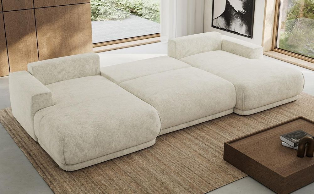 Beiges Ecksofa mit ausgezogener Schlaffunktion im modernen Wohnzimmer.