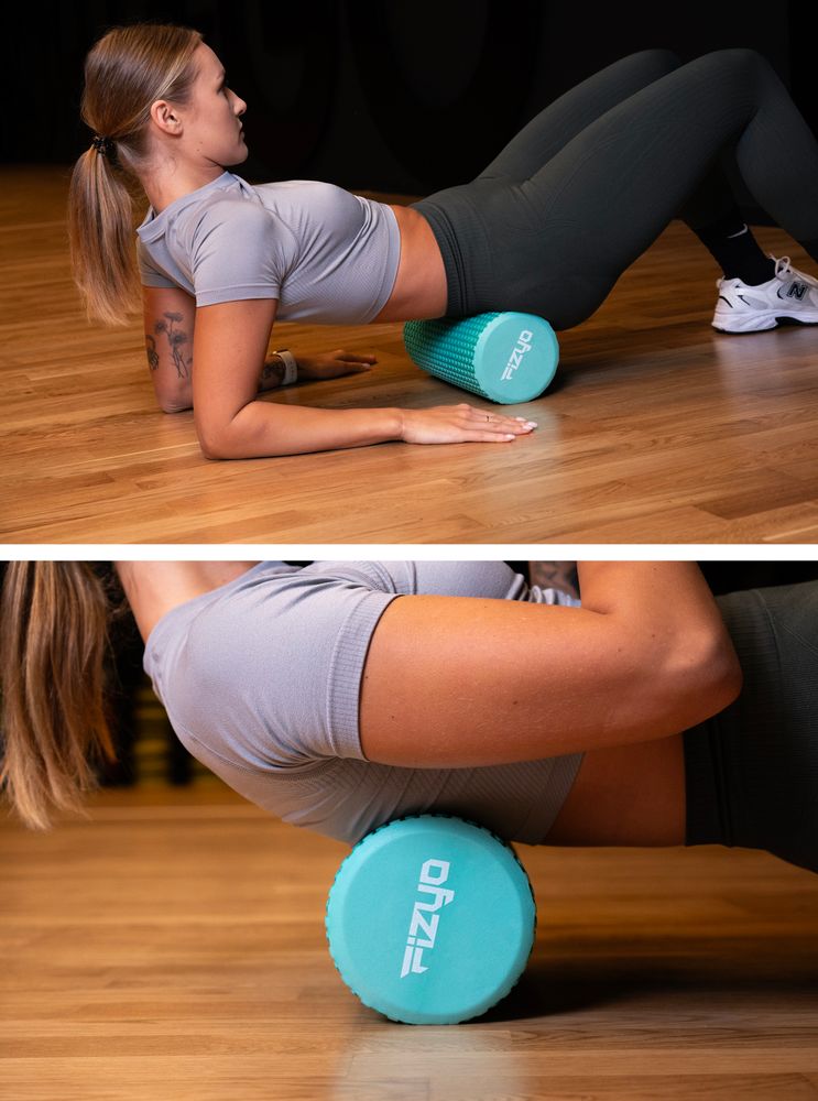 Trening Fitness z wałkiem do masażu z wypustkami 30x15 cm FIZYO — osoba wykonuje ćwiczenia