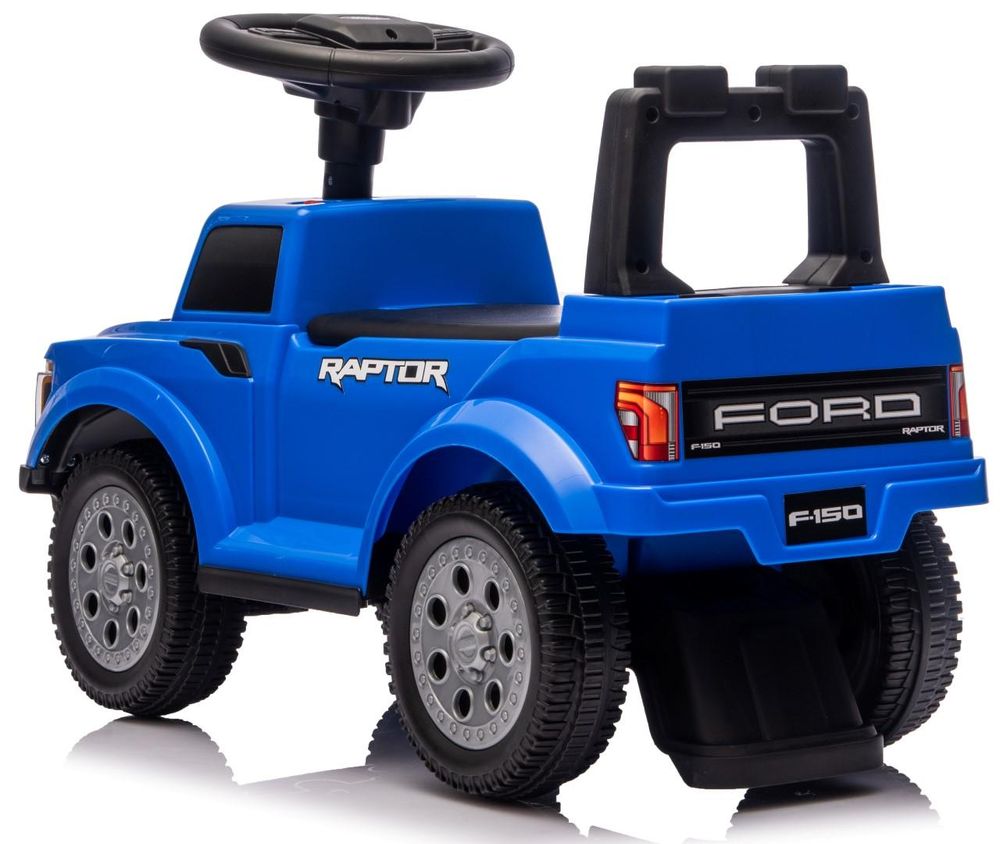 Achteraanzicht van de loopauto met zicht op de rugleuning en open opbergruimte