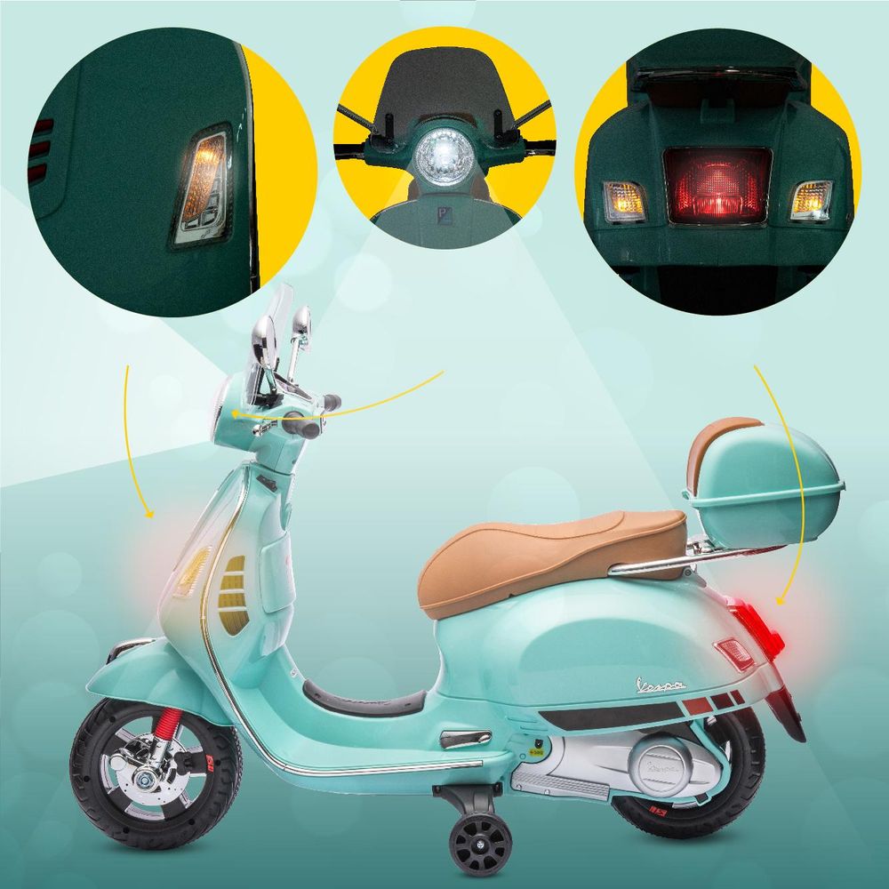 Skuter Vespa Sun Baby z podświetlonymi światłami, widok z boku i detale lamp.