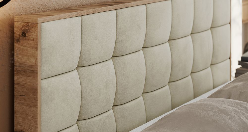 Vergrößern Sie das Kopfteil des Boxspringbettes, das Foto zeigt beige Stoff