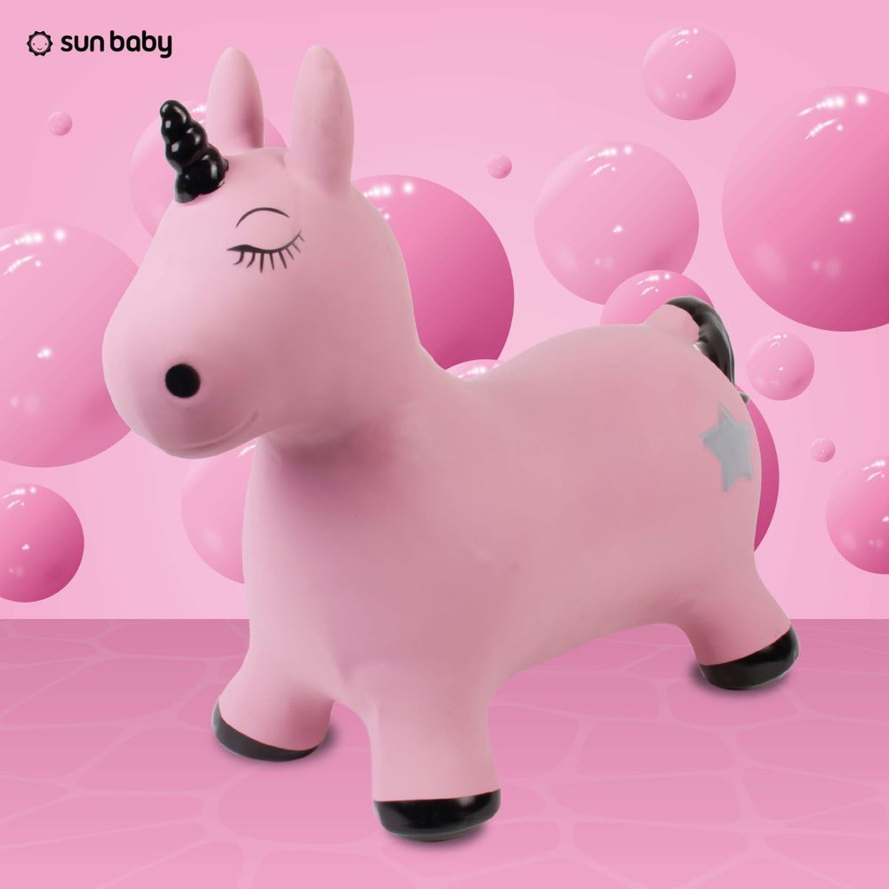 Animal sauteur licorne rose-noir SUN BABY sur fond rose.