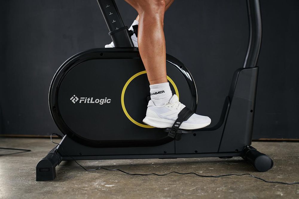 Das Bild zeigt die Schwungmasse des Ergometers Cardio X2 und die Pedale mit Fußschlaufen