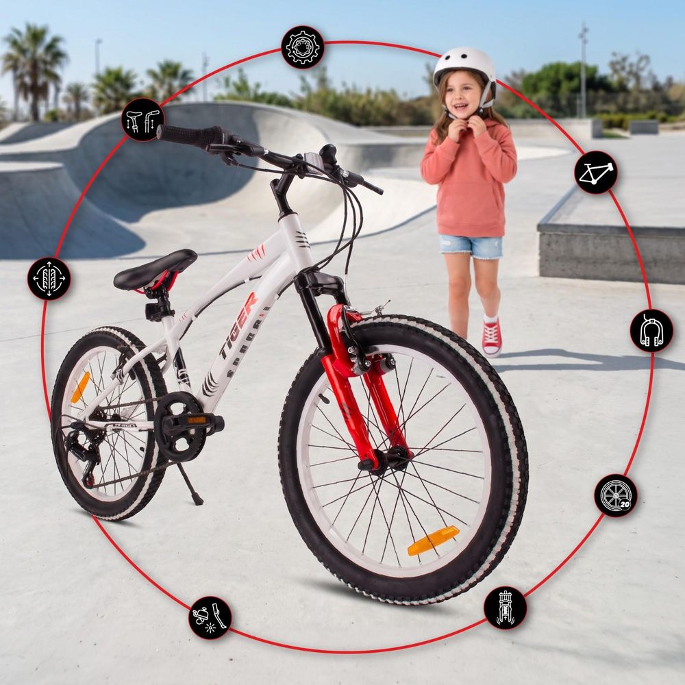 Bicicleta SUN BABY Tiger Bike en un parque, mostrando los frenos V-brake y el diseño robusto.