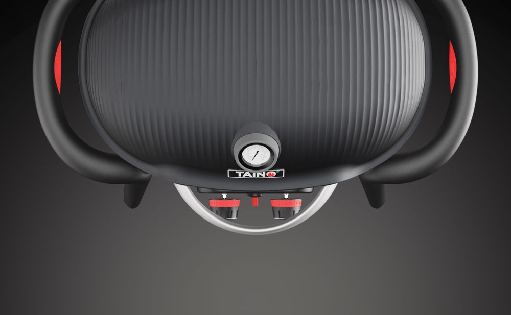 Das Bild zeigt einen schwarzen Tischgrill mit 2 Drehreglern, Griffen und einem Thermometer.