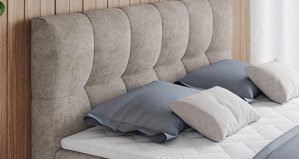 Vergrößern Sie das Kopfteil des Boxspringbettes, das Foto zeigt beige Stoff