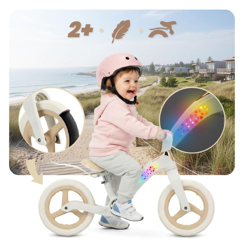 Kind op loopfiets buiten, close-up van spatbord en LED-verlichting